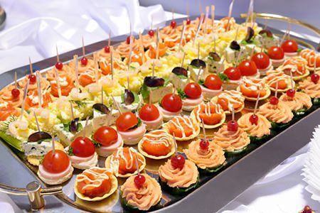 A tray of catered food.