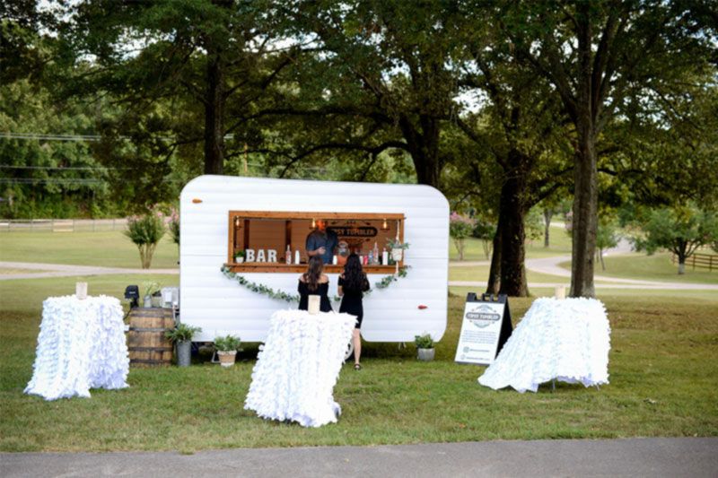 Outdoor bar and catered food.