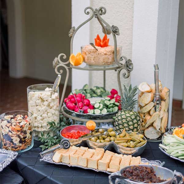 Catered foods are prepared for guests.