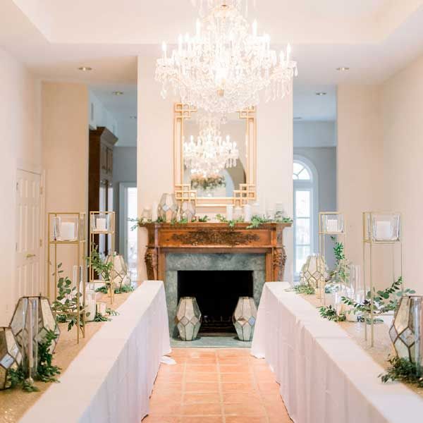 The Long dining Hall with large chandelier is one of the many delights at Tuscan Ridge.