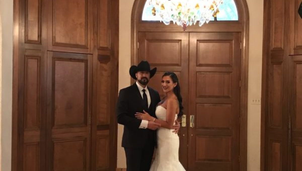 Bride and Groom at the doorway at Tuscan Ridge.